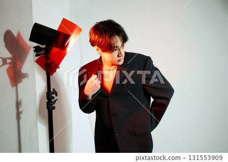 Portrait of a cool young Asian man with makeup Portrait of a cool young Asian man with makeup 131553909