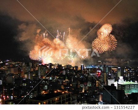 Aerial view of the Kinko Bay Summer Night Fireworks Festival lighting up the night sky in Kagoshima 131554227