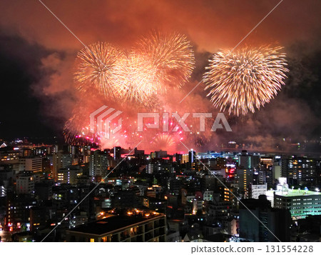Aerial view of the Kinko Bay Summer Night Fireworks Festival lighting up the night sky in Kagoshima 131554228