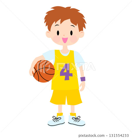 A boy wearing a yellow uniform holding a basketball 131554233