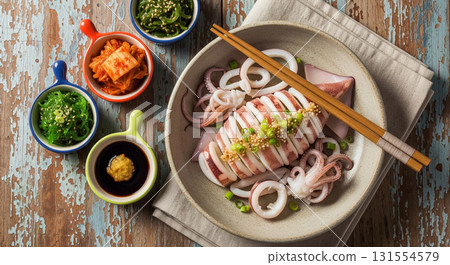Boiled Squid with Assorted Korean Side Dishes 131554579