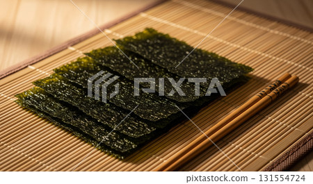 Roasted Seaweed with Chopsticks on Bamboo Mat 131554724
