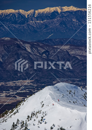 Winter view of Akaiwanotoge and the Central Alps from Mount Iodake in the Yatsugatake Mountain Range 131556216