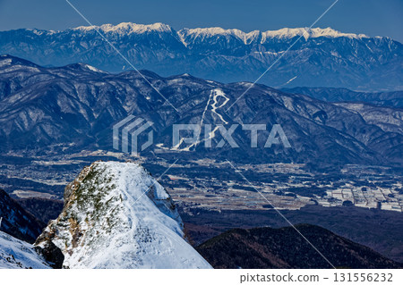 Daidoshin and the Central Alps seen from the Yokodake ridgeline of the Yatsugatake mountain range in winter Daidoshin and the Central Alps seen from the Yokodake ridgeline of the Yatsugatake mountain range in winter 131556232
