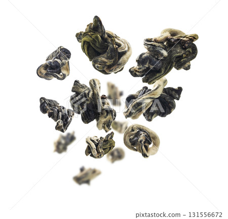 Dried Oolong tea levitates on a white background Dried Oolong tea levitates on a white background 131556672