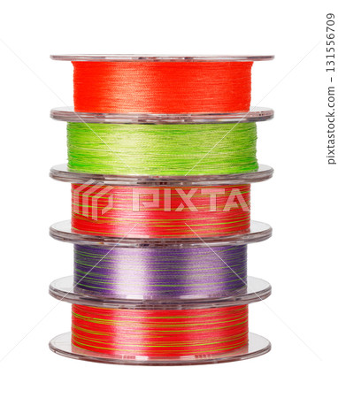 Colorful fishing lines stacked on spools forming a pyramid 131556709