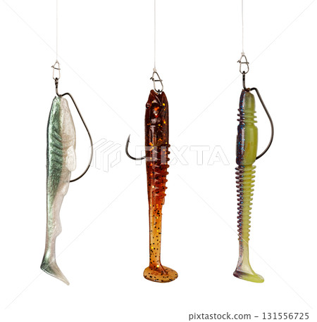 Three fishing lures hanging on white background 131556725