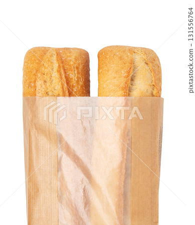 Two baguettes coming out of paper bag isolated on white background 131556764