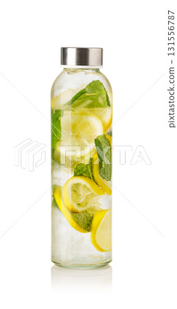 Refreshing water with lemon and mint in a glass bottle: promoting healthy hydration Refreshing water with lemon and mint in a glass bottle: promoting healthy hydration 131556787