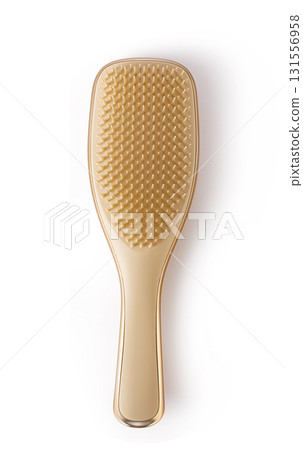 Golden hairbrush with ergonomic handle on transparent background Golden hairbrush with ergonomic handle on transparent background 131556958