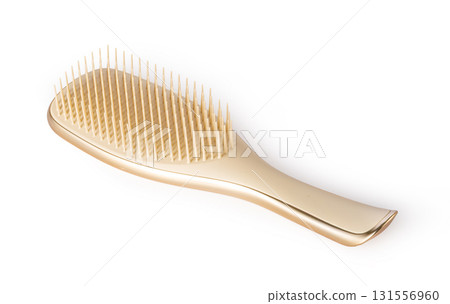 Modern hairbrush with golden details lying on transparent background Modern hairbrush with golden details lying on transparent background 131556960