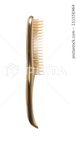 Golden hairbrush with plastic bristles on transparent background 131556964
