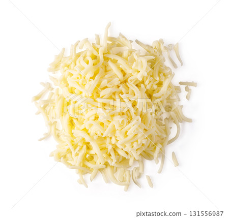 Grated mozzarella cheese forming a pile on white background Grated mozzarella cheese forming a pile on white background 131556987