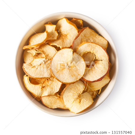 Dried apple slices in bowl, healthy snack concept 131557040