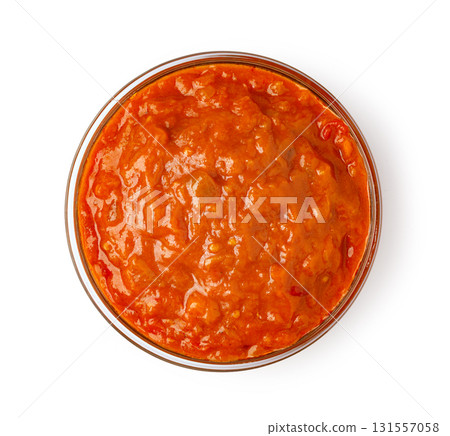 Ajvar dip sauce in glass bowl on white Ajvar dip sauce in glass bowl on white 131557058