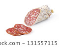 Salami sausage whole and sliced pieces on white 131557115