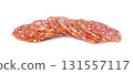 Sliced dry cured sausage on white background 131557117