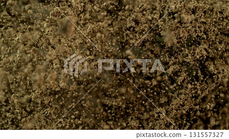 Freeze Motion Shot of Soil Explosion , Top Shot 131557327