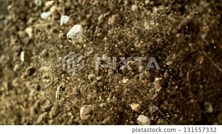 Freeze Motion Shot of Soil Explosion , Top Shot Freeze Motion Shot of Soil Explosion , Top Shot 131557332