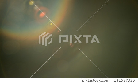 Abstract background of real lens flare for overlay or transition 131557339