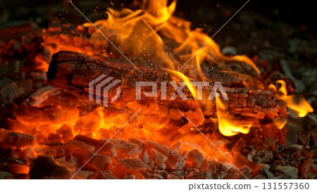 Detail Shot of Hot Embers with Flying Sparks Detail Shot of Hot Embers with Flying Sparks 131557360