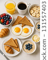Healthy breakfast assortment with eggs and toast 131557403