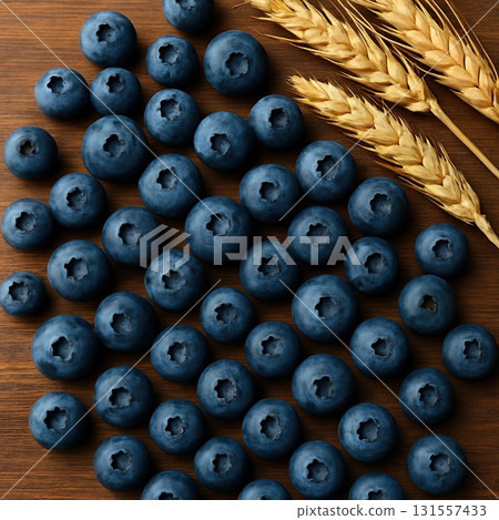 Fresh blueberries with wheat ears on wooden table Fresh blueberries with wheat ears on wooden table 131557433