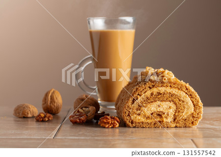Walnut and buttercream roll: a traditional Oriental pastry. 131557542