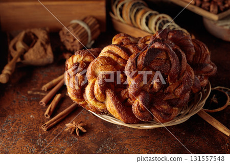 Traditional Scandinavian soft pretzels with cinnamon and sugar. 131557548