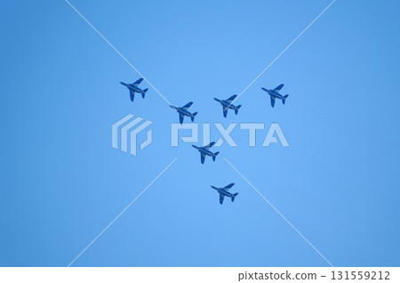 Blue Impulse flying in the blue sky Blue Impulse flying in the blue sky 131559212