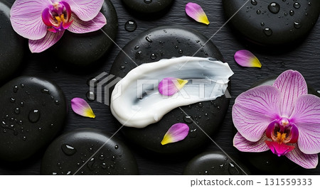 Indulge in radiant skin with a nourishing cream, surrounded by zen stones and delicate orchid petals for a spa-like experience of beauty and bliss 131559333