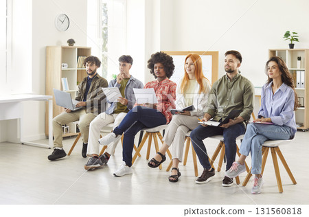 Team of diverse people attending corporate work meeting or business seminar in office 131560818