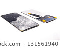 two broken touchscreens lying side by side: a concept for a display replacement repair shop 131561940