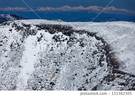 The summit of Mt. Iodake and the Myoko-Hiuchi mountain range seen from Mt. Yokodake in the Yatsugatake mountain range in winter The summit of Mt. Iodake and the Myoko-Hiuchi mountain range seen from Mt. Yokodake in the Yatsugatake mountain range in winter 131562305