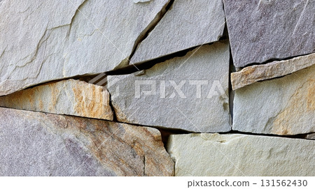 Close-up view of a textured stone surface 131562430