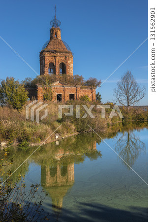 Ruins of Transfiguration Church in Zherdevo, Tula region, reflected in water Ruins of Transfiguration Church in Zherdevo, Tula region, reflected in water 131562901