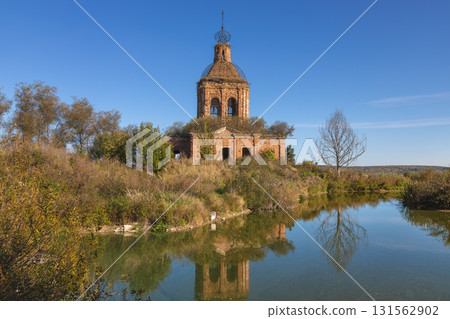 Ruins of Transfiguration Church in Zherdevo, Tula region, reflected in water 131562902
