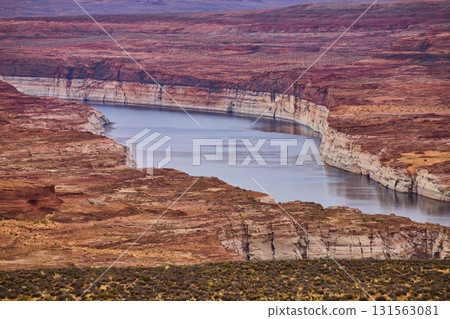 Winding River Through Red Rock Desert Canyon Lake Powell Aerial 131563081