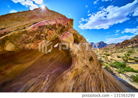 Sunlit Arch Formation and Desert Landscape in Gold Butte National Monument Sunlit Arch Formation and Desert Landscape in Gold Butte National Monument 131563290