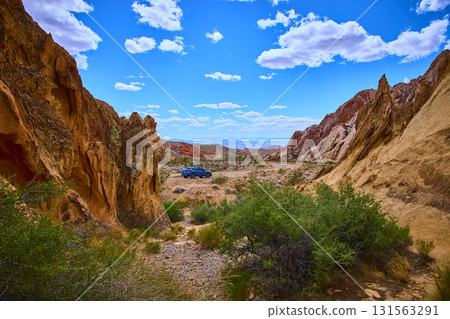 Desert Road and Red Rock Formations with Subaru in Gold Butte National Monument 131563291