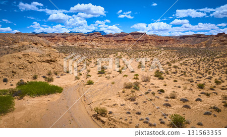 Aerial Desert Landscape With Red Rock Formations And Blue Sky 131563355