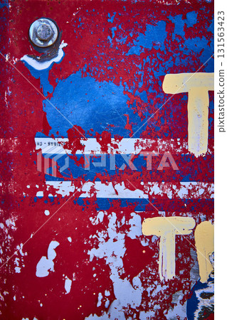 Peeling Paint Texture on Weathered Red and Blue Metal Surface with Rusted Bolt Peeling Paint Texture on Weathered Red and Blue Metal Surface with Rusted Bolt 131563423