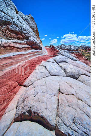 Layered Sandstone Formations and Vibrant Striations in White Pocket Arizona Layered Sandstone Formations and Vibrant Striations in White Pocket Arizona 131563492
