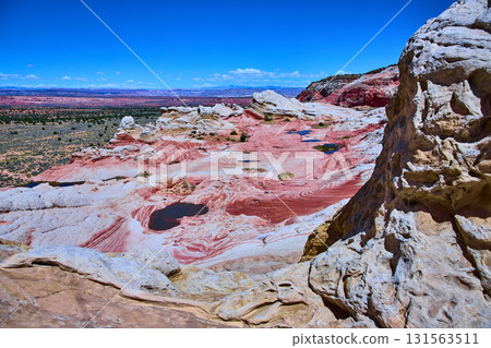 Colorful Swirling Sandstone and Pools White Pocket Arizona Desert Landscape 131563511