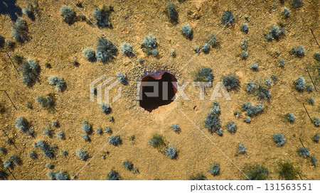 Aerial Devils Nostril Sinkhole and Desert Shrubs in Gold Butte National Monument 131563551
