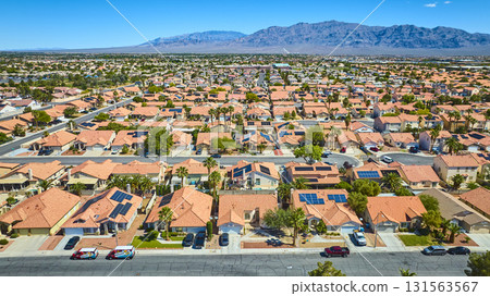 Aerial Las Vegas Residential Neighborhood With Rooftop Solar Panels And Mountain View Aerial Las Vegas Residential Neighborhood With Rooftop Solar Panels And Mountain View 131563567