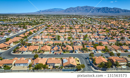 Aerial Residential Suburb Las Vegas Nevada with Desert Mountain Background 131563573