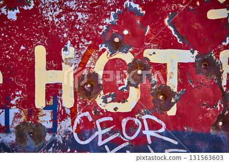 Weathered Metal Surface With Bullet Holes and Graffiti Texture Weathered Metal Surface With Bullet Holes and Graffiti Texture 131563603