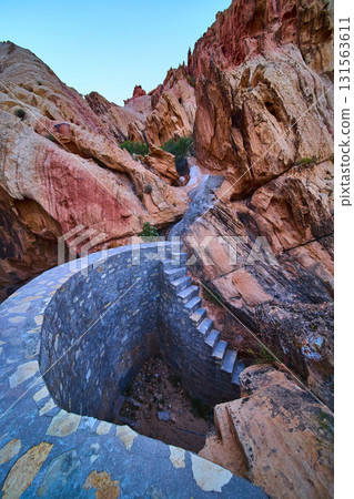 Stone Cistern And Stairway Among Red Rock Cliffs In Desert Landscape Stone Cistern And Stairway Among Red Rock Cliffs In Desert Landscape 131563611