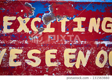 Distressed Metal Sign With Exciting Text And Bullet Holes Texture Detail Distressed Metal Sign With Exciting Text And Bullet Holes Texture Detail 131563660
